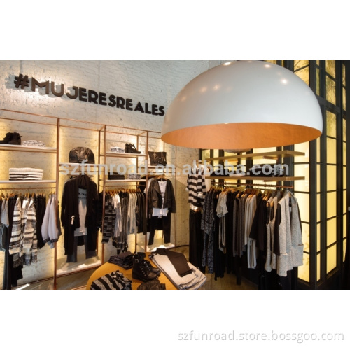 Clothes shop interior designs wooden display tables metal rack displays and wall mounted wood shelves